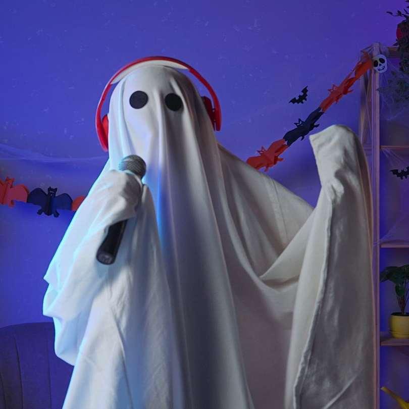 Ghost holding a microphone