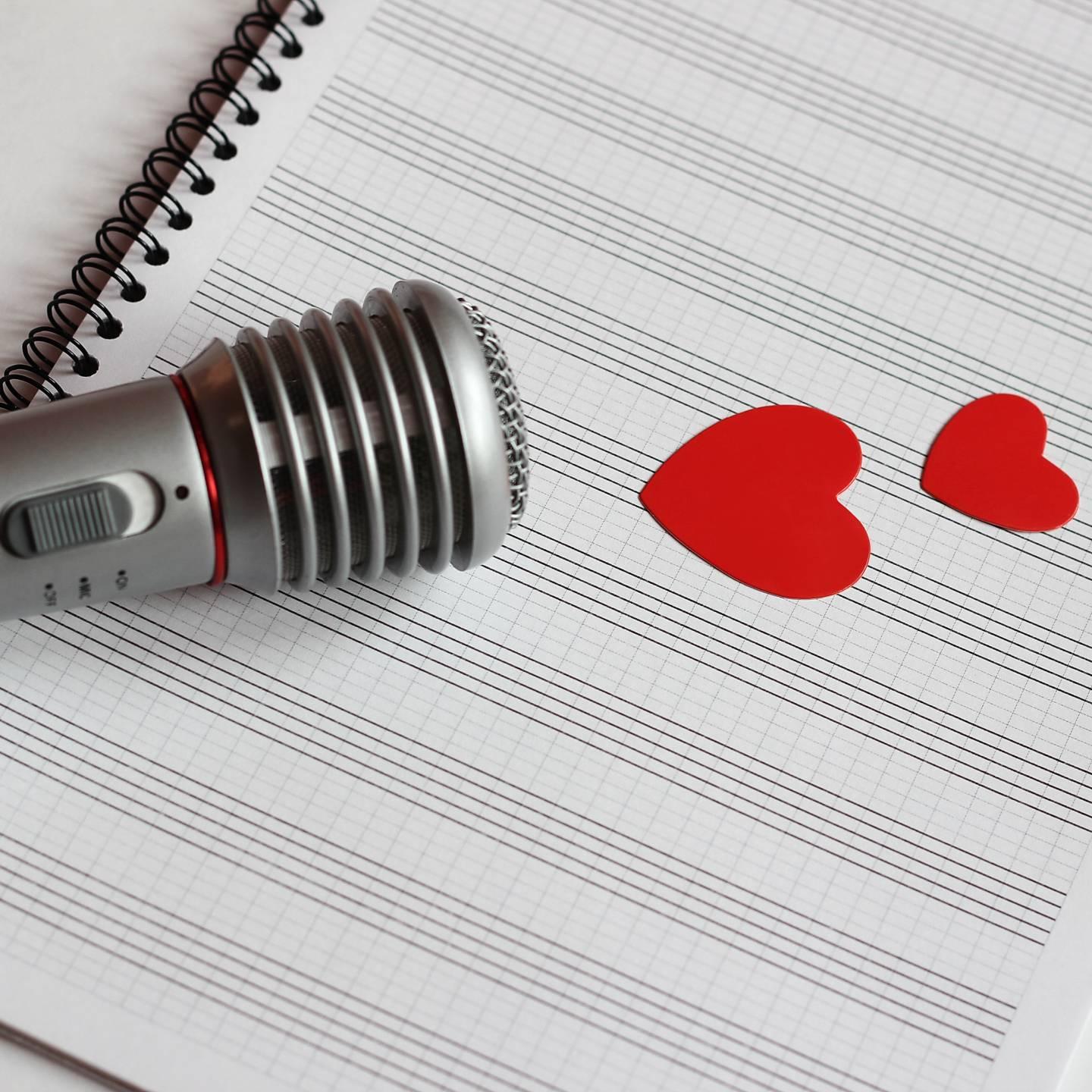 A microphone with hearts.