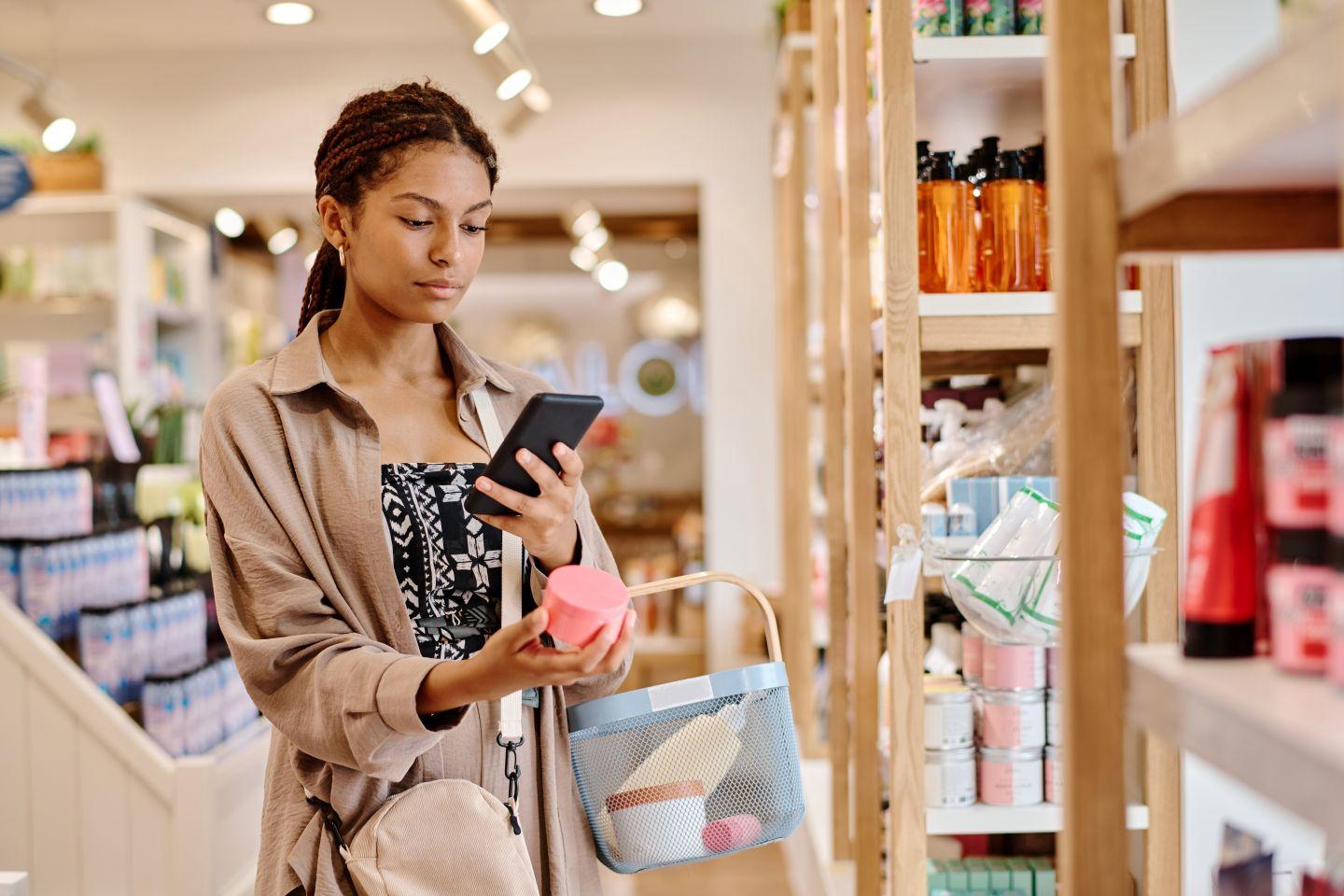 A woman shopping with her phone.