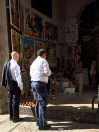 NRF CEO Matthew Shay (left) and former NRF Chairman Steve Sadove visit a market space in Old Havana.
